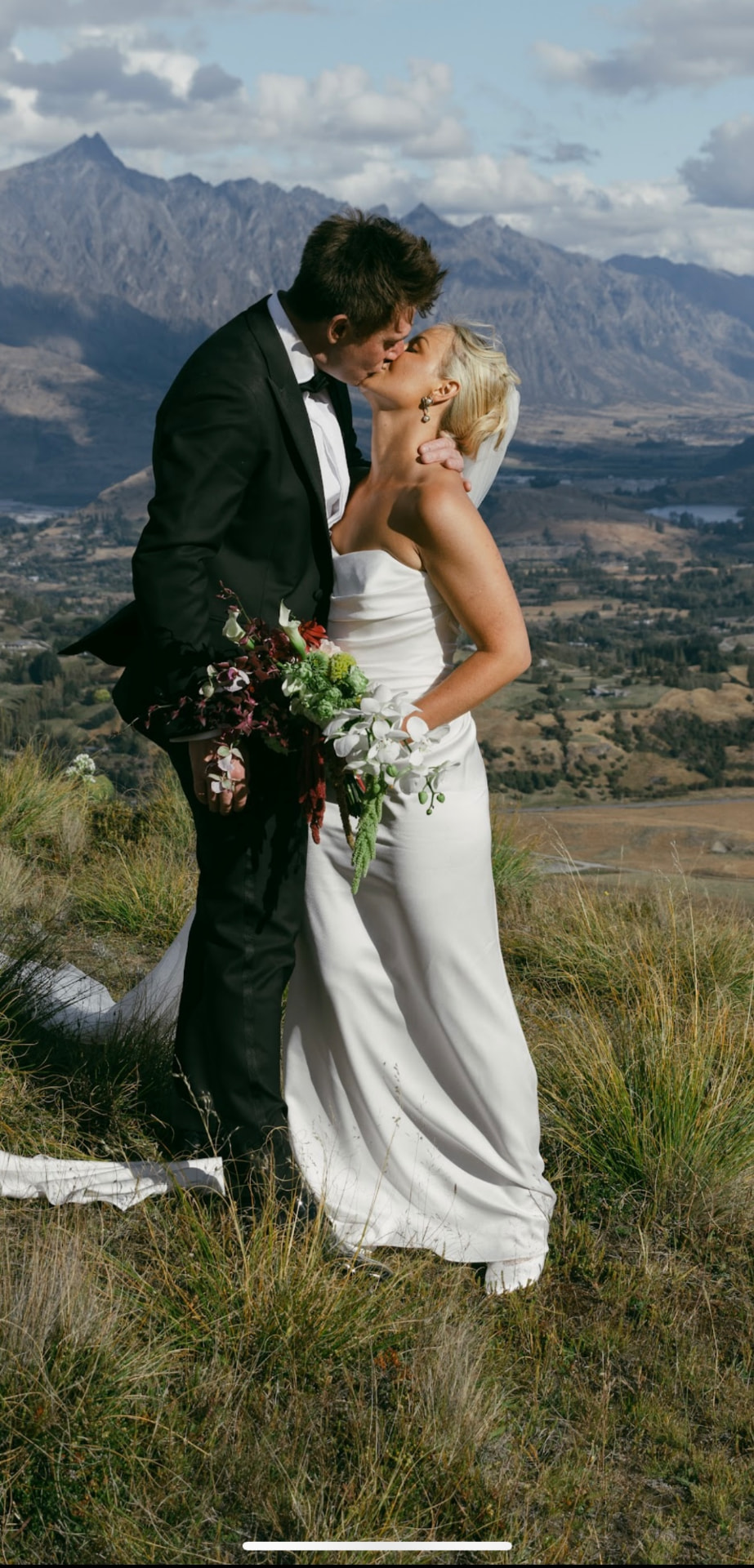 Bride and groom in front of The Remarkables